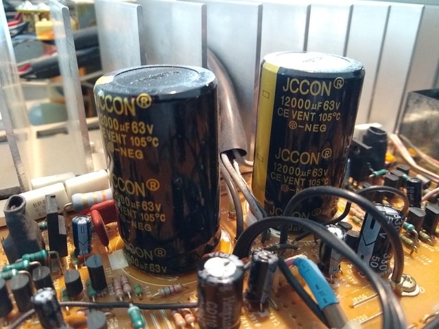 Main electrolytic capacitors connected to the rectifier bridge